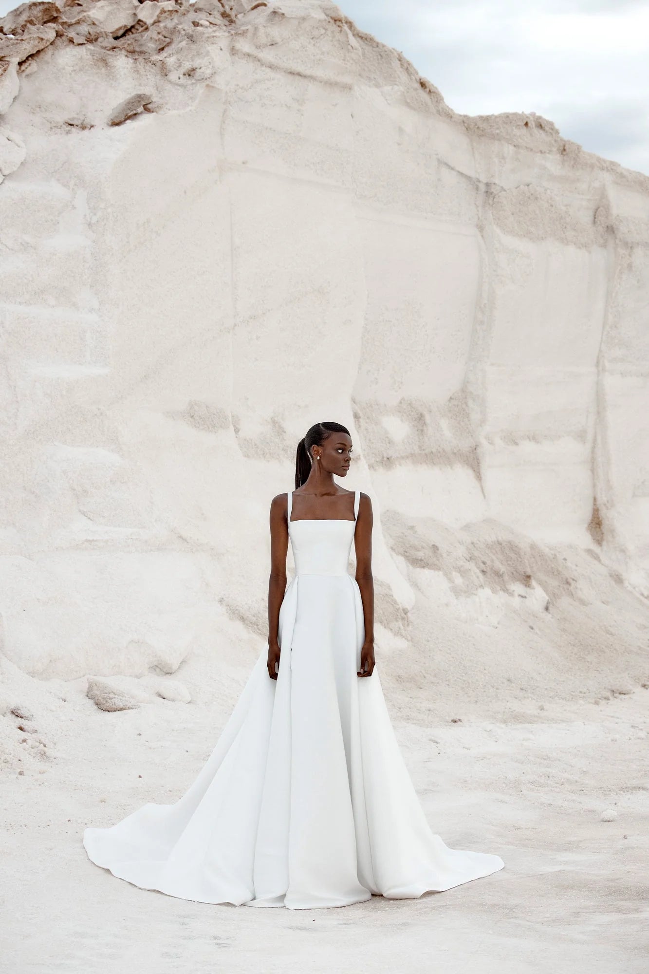 kyha wedding dress Nia Artful lace placement at the back of the skirt creates a paradigm Chosen By KYHA, Banks Wedding